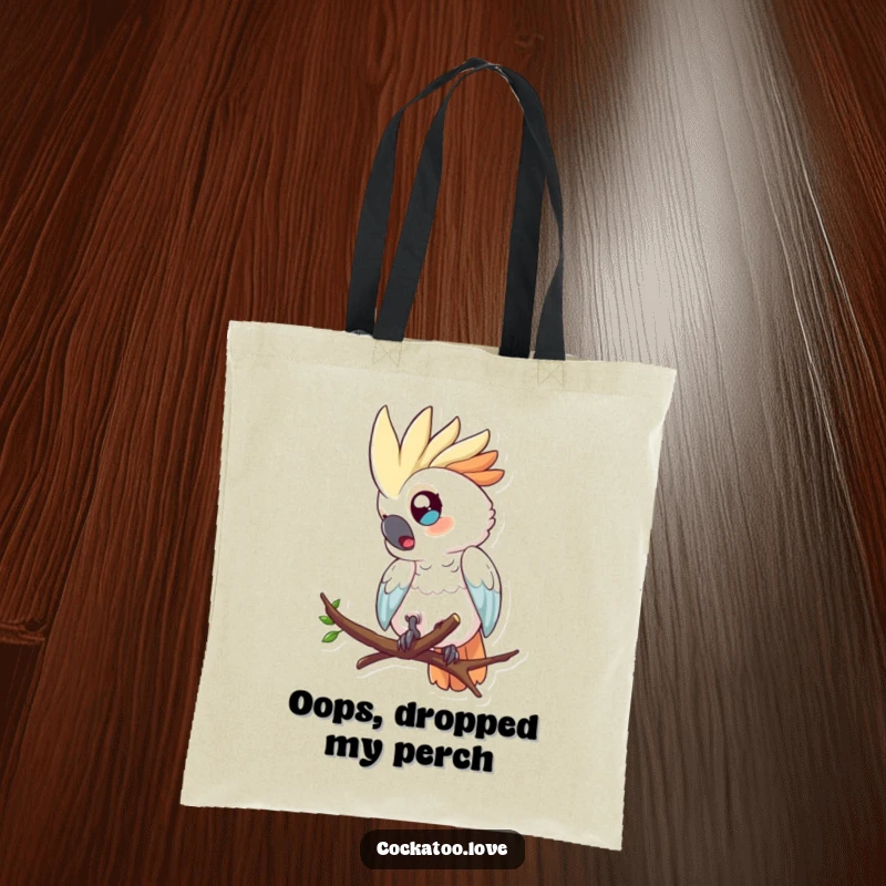 Funny tote bag featuring a surprised cockatoo character with wide eyes, comically tumbling from a branch.