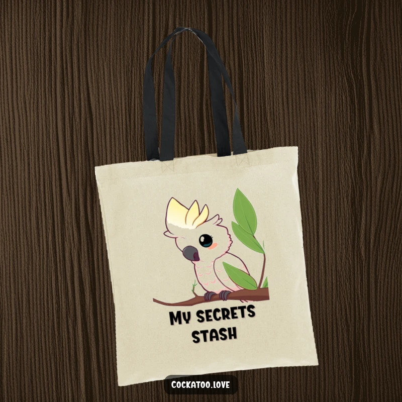 Funny tote bag featuring a curious cockatoo peeking from behind a leaf, perfect for carrying items with a playful, observant touch, a great funny gift.